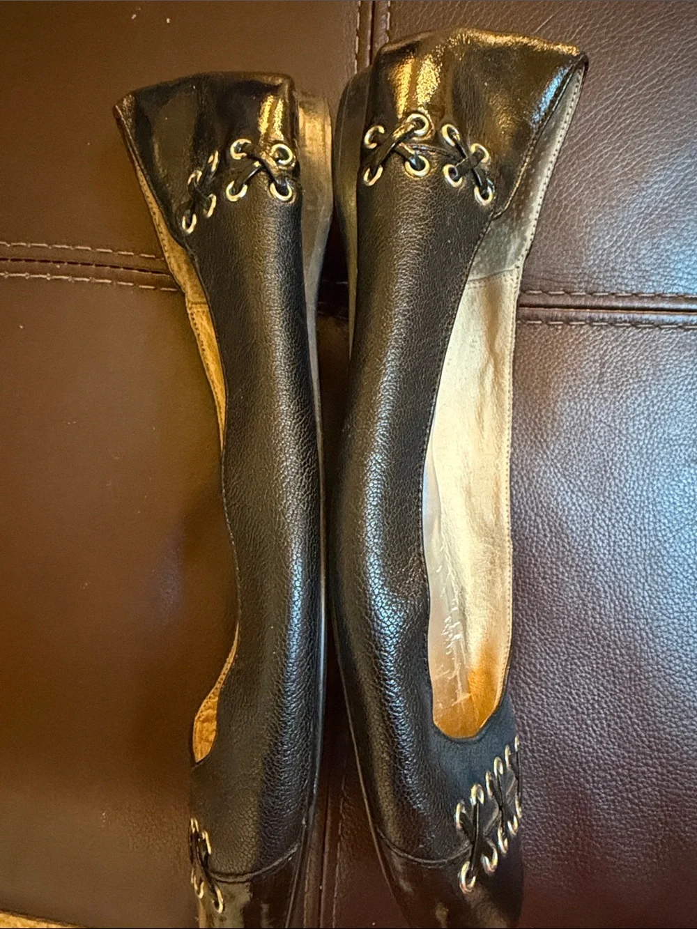 Micheal Kors black flats with grommet /leather detail sz 9.5
